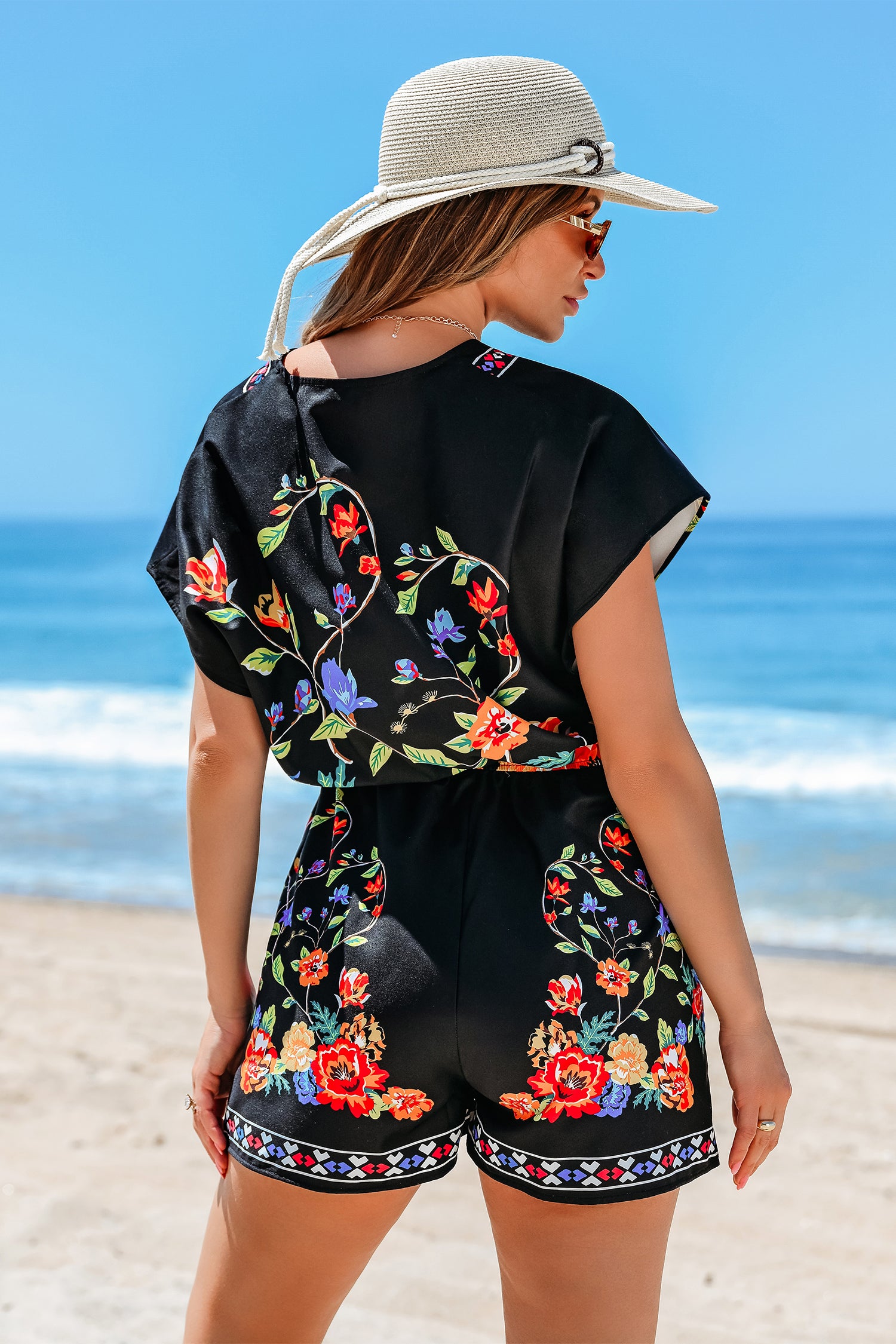Hibiscus Glow Tropical Romper